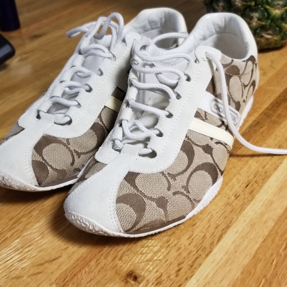 Size 7 women's Coach tennis shoes.